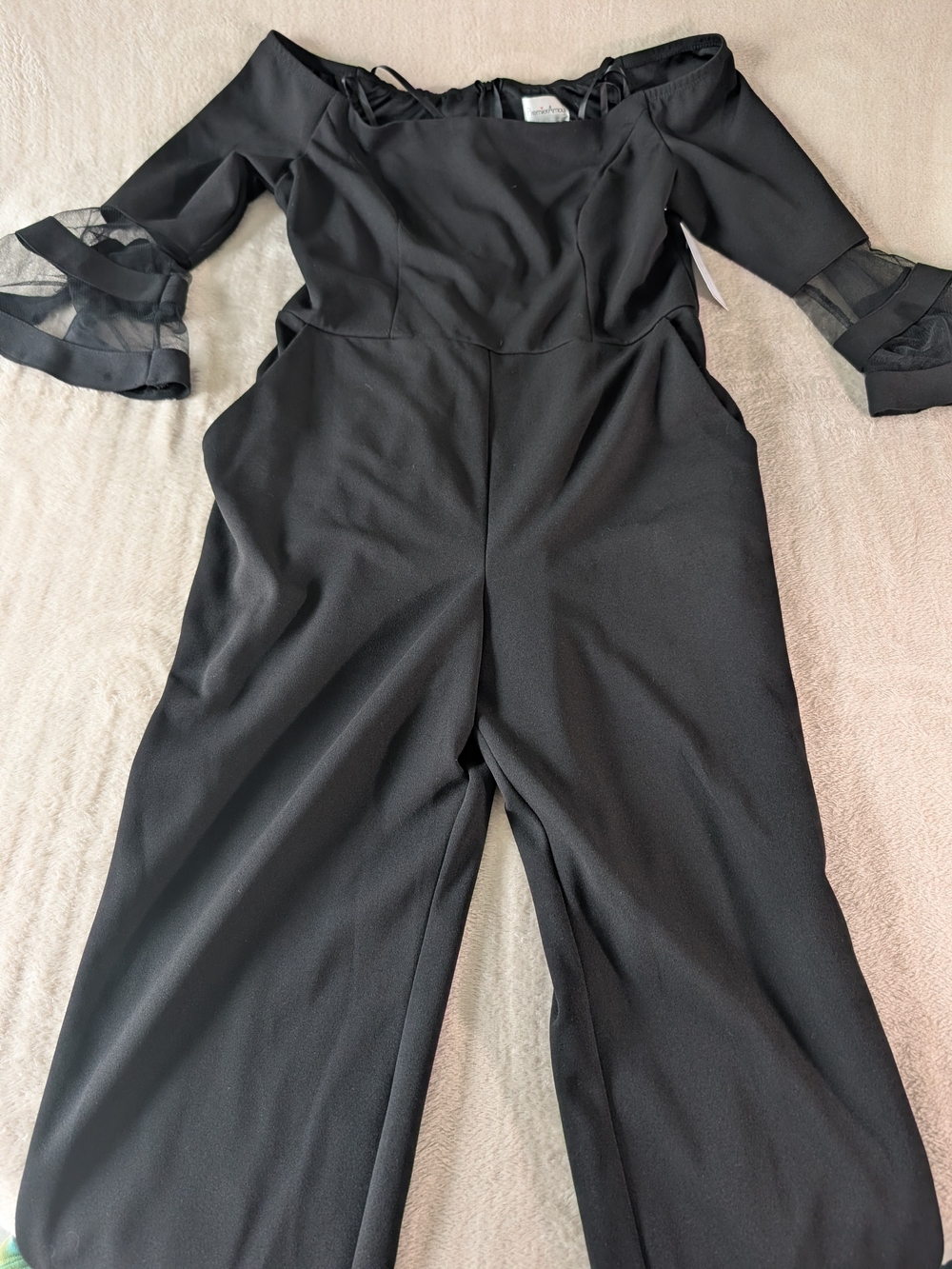 Elegant Black Off-Shoulder Jumpsuit with Sheer Ruffle Sleeves